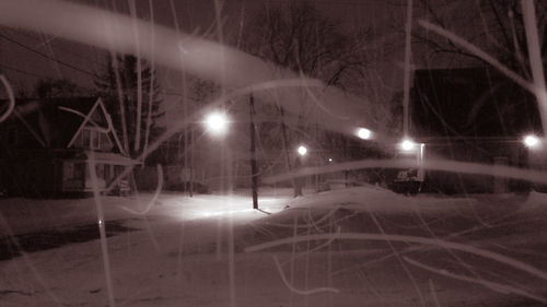 Illuminated street lights at night