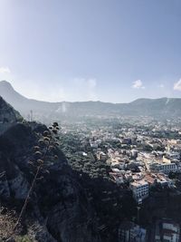 High angle view of buildings in city against sky