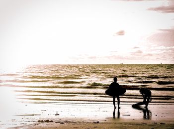 Scenic view of sea at sunset