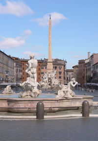 Statue of fountain in city