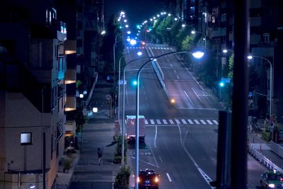 View of illuminated street at night