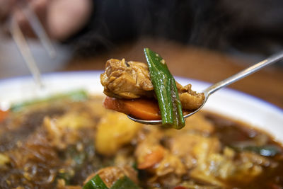 Close-up of hand holding food