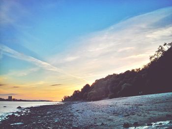 Scenic view of sea at sunset