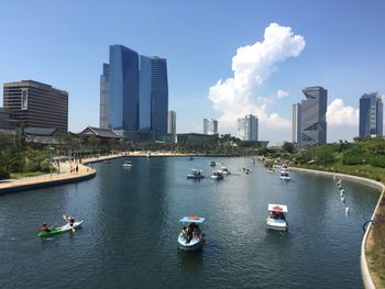 Panoramic view of river and buildings against sky