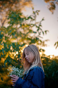 Portrait of young woman looking away