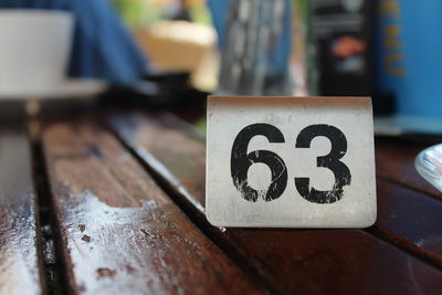 Close-up of text on table