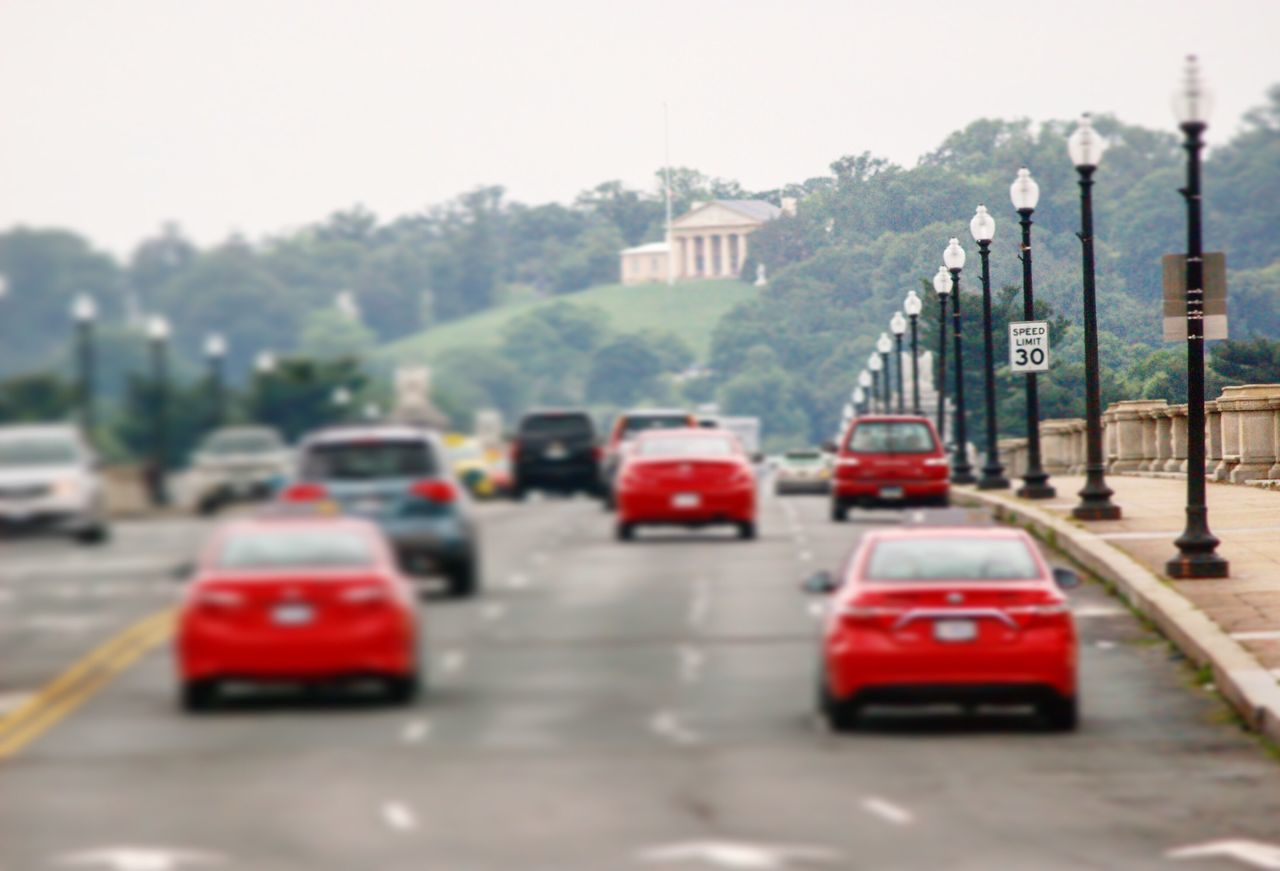 VEHICLES ON ROAD IN CITY