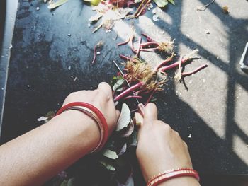 High angle view of man holding hands