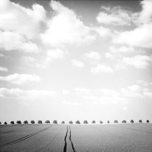 View of landscape against cloudy sky