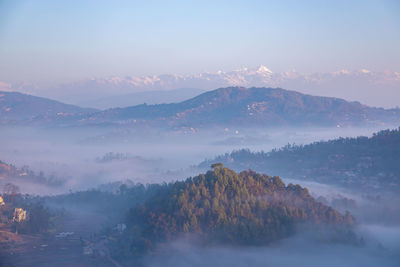 Scenic view of mountains against sky during sunset