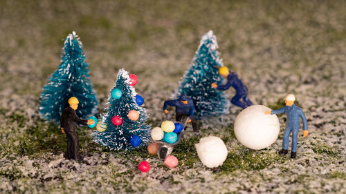 Multi colored figurine on land