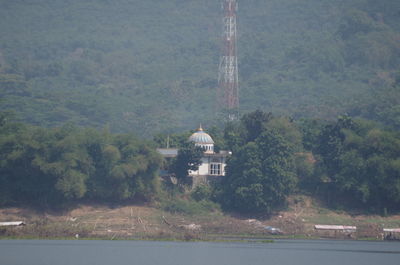 View of traditional building by mountain