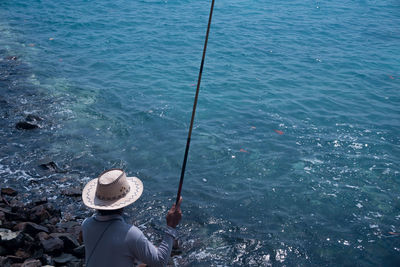 Man standing in sea