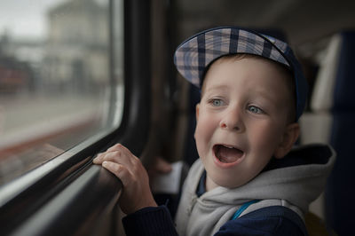 Portrait of cute baby girl in train
