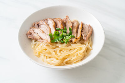 High angle view of noodles in bowl on table