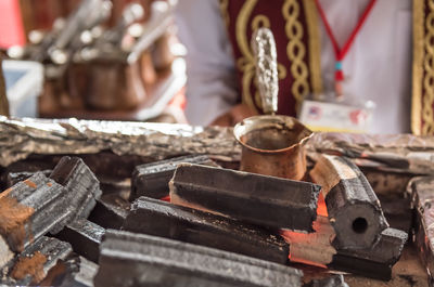 Close-up of old machine on table