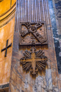 Low angle view of statue against building