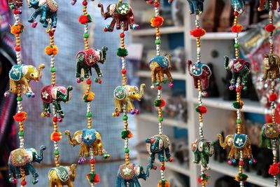 Close-up of hanging for sale in market