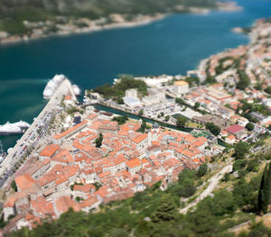 High angle view of townscape by sea