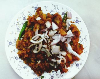 High angle view of meat in plate on table