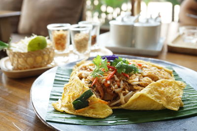 Close-up of food served on table