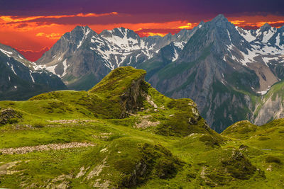 Scenic view of mountains against sky during sunset