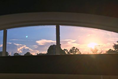 Sun shining through clouds