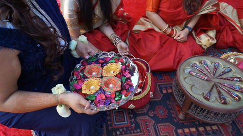 High angle view of people holding food