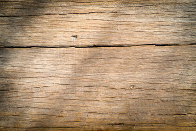 Full frame shot of weathered wooden plank