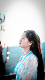 Young woman looking away