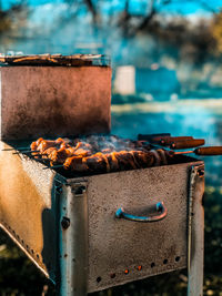 Close-up of fire on barbecue grill