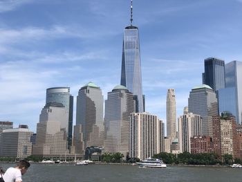 Modern buildings in city against sky