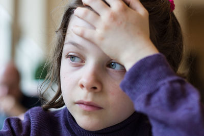 Close-up of girl looking away