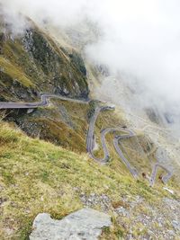 High angle view of winding road on land