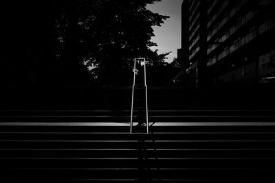 Silhouette of building against sky at night