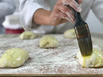 Close-up of person preparing food