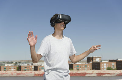 Virtual reality experience young man having a funny moment