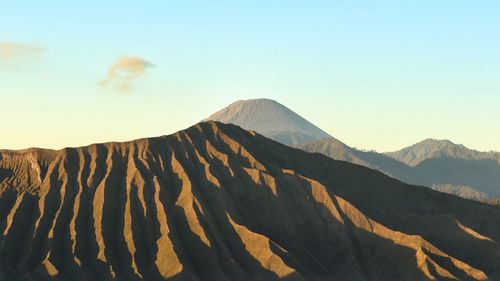 Scenic view of mountain range against sky