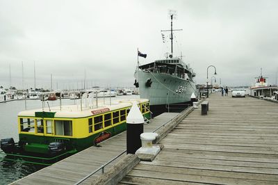 Boats moored at jetty