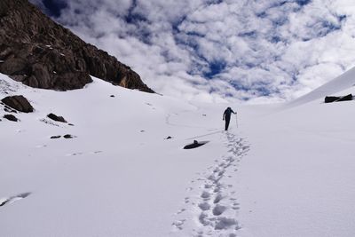 Scenic view of snow mountains against sky