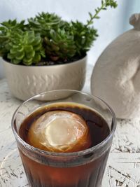 High angle view of drink in glass on table