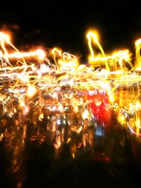 Blurred motion of illuminated lights at night