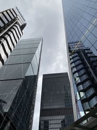 Low angle view of modern buildings against sky