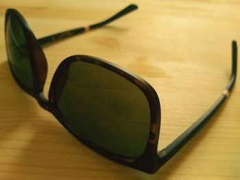 Close-up of sunglasses on table