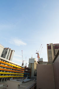 Modern cityscape against sky