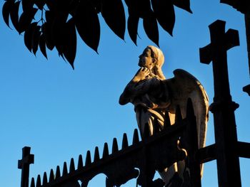 Low angle view of statue against clear sky