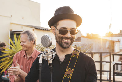 Portrait of young man wearing hat
