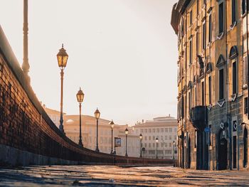 Street amidst buildings against sky