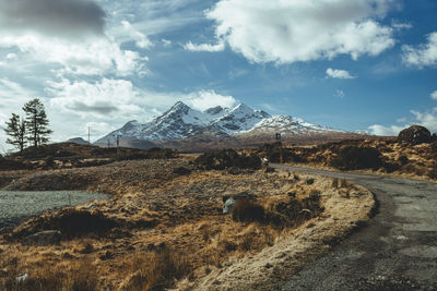 Scenic view of snowcapped mountains against sky