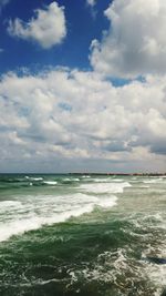 Scenic view of calm sea against clear sky